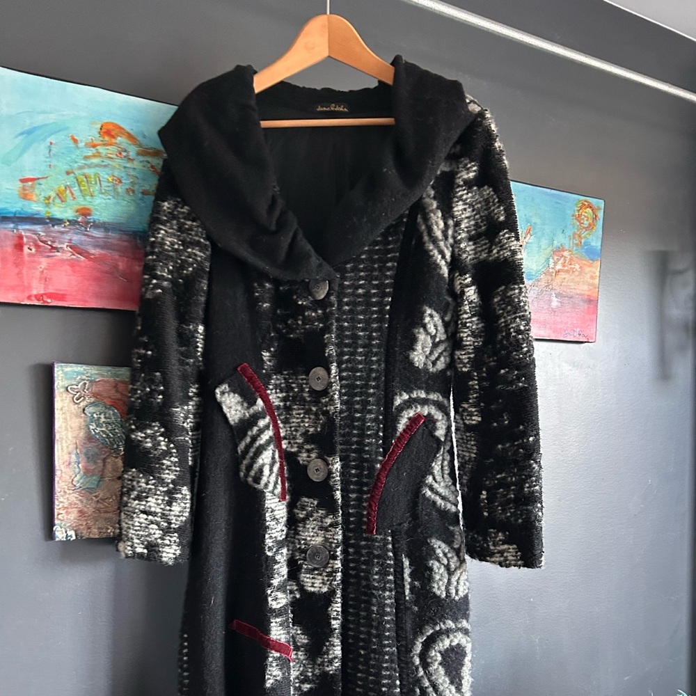 High quality designer’s long coat,made from wool,priced for a quick sale!